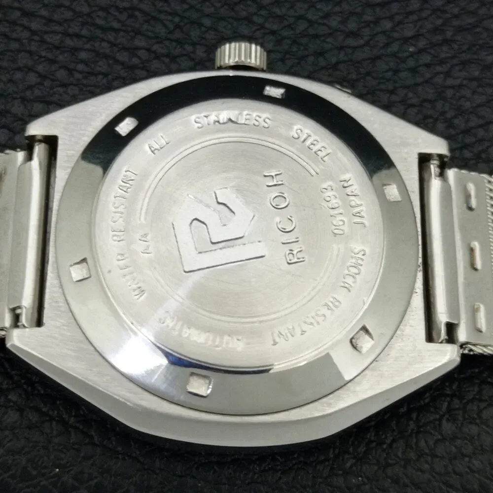 Vintage 1976 Ricoh Automatic Mens Silver Watch W/daydate & Patina accents